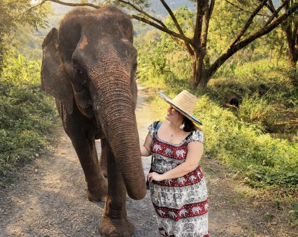 Alexis walking with an elephant Alexis walking with an elephant
